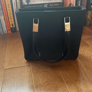 DKNY black hand held purse